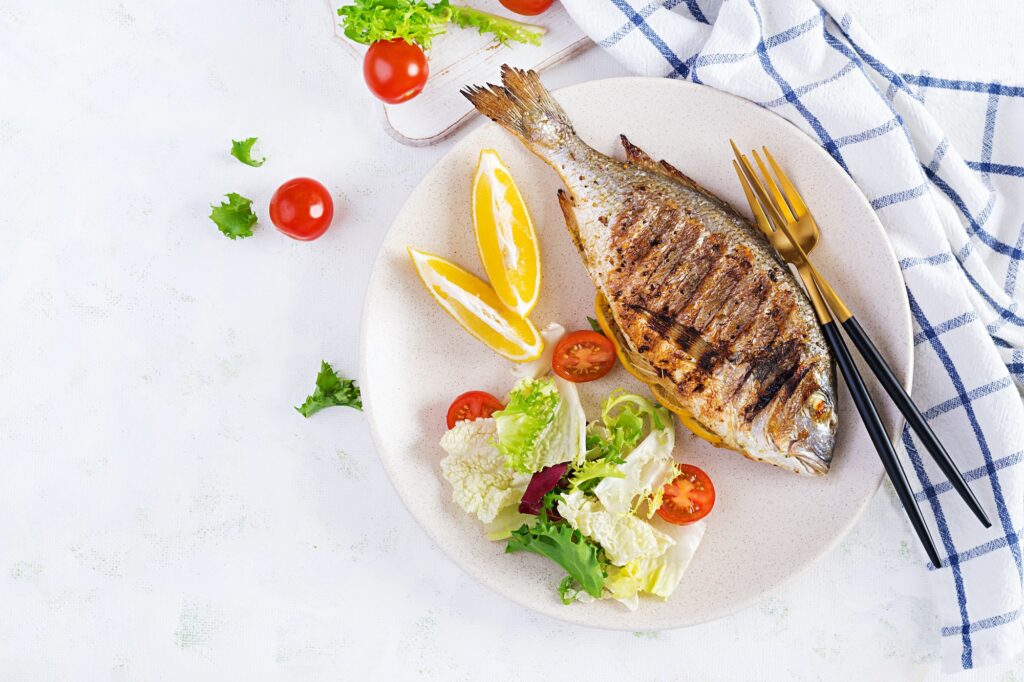 Delicious grilled dorado or sea bream fish