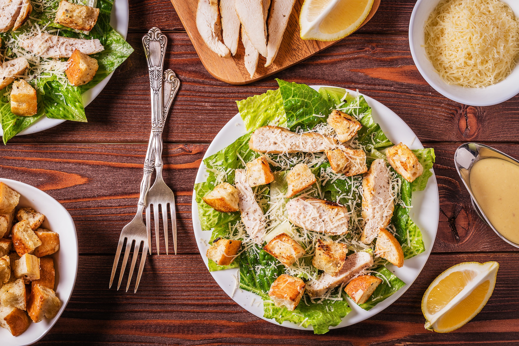Homemade Chicken Caesar Salad with Cheese and Croutons.